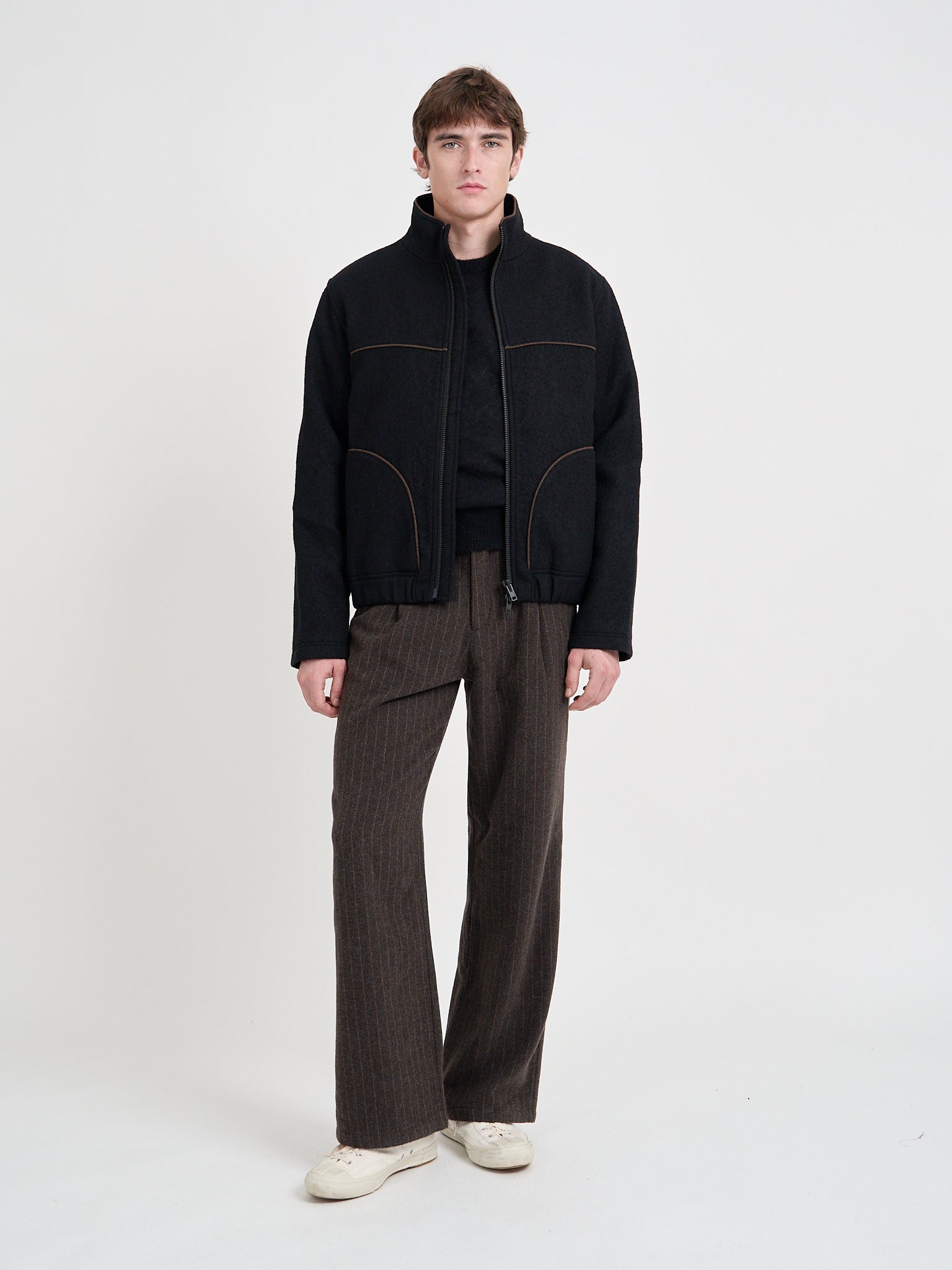 Model wearing Oliver Spencer Men's Black Zip-Through Wool Jacket