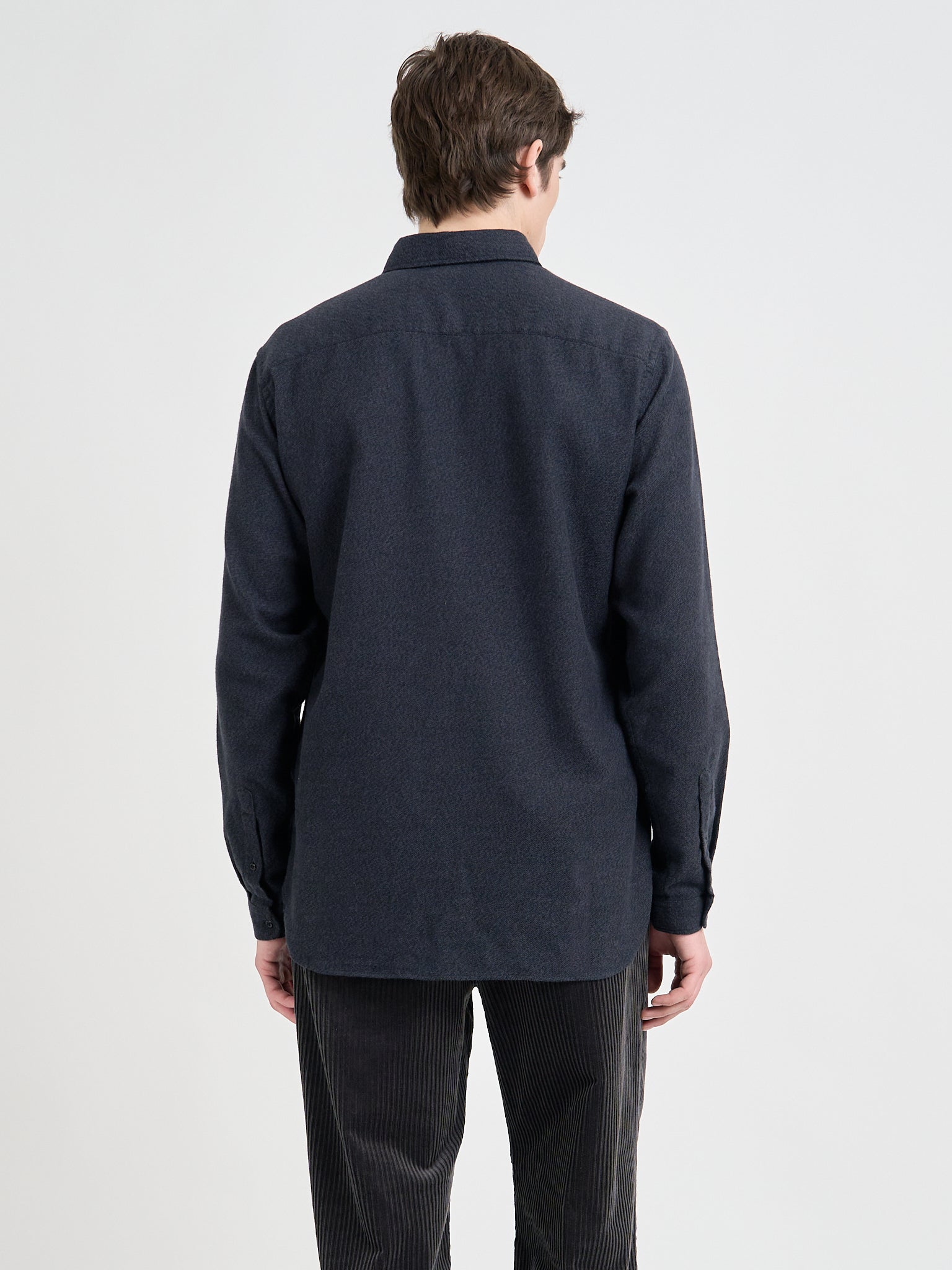 Back shot of model wearing Oliver Spencer Men's Navy Brushed Cotton Button-Down Shirt