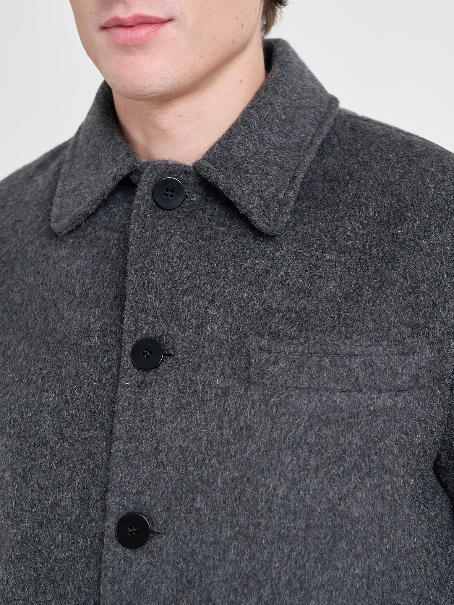 Close up collar shot of model wearing Oliver Spencer Men's Charcoal Recycled Wool And Mohair Chore Jacket