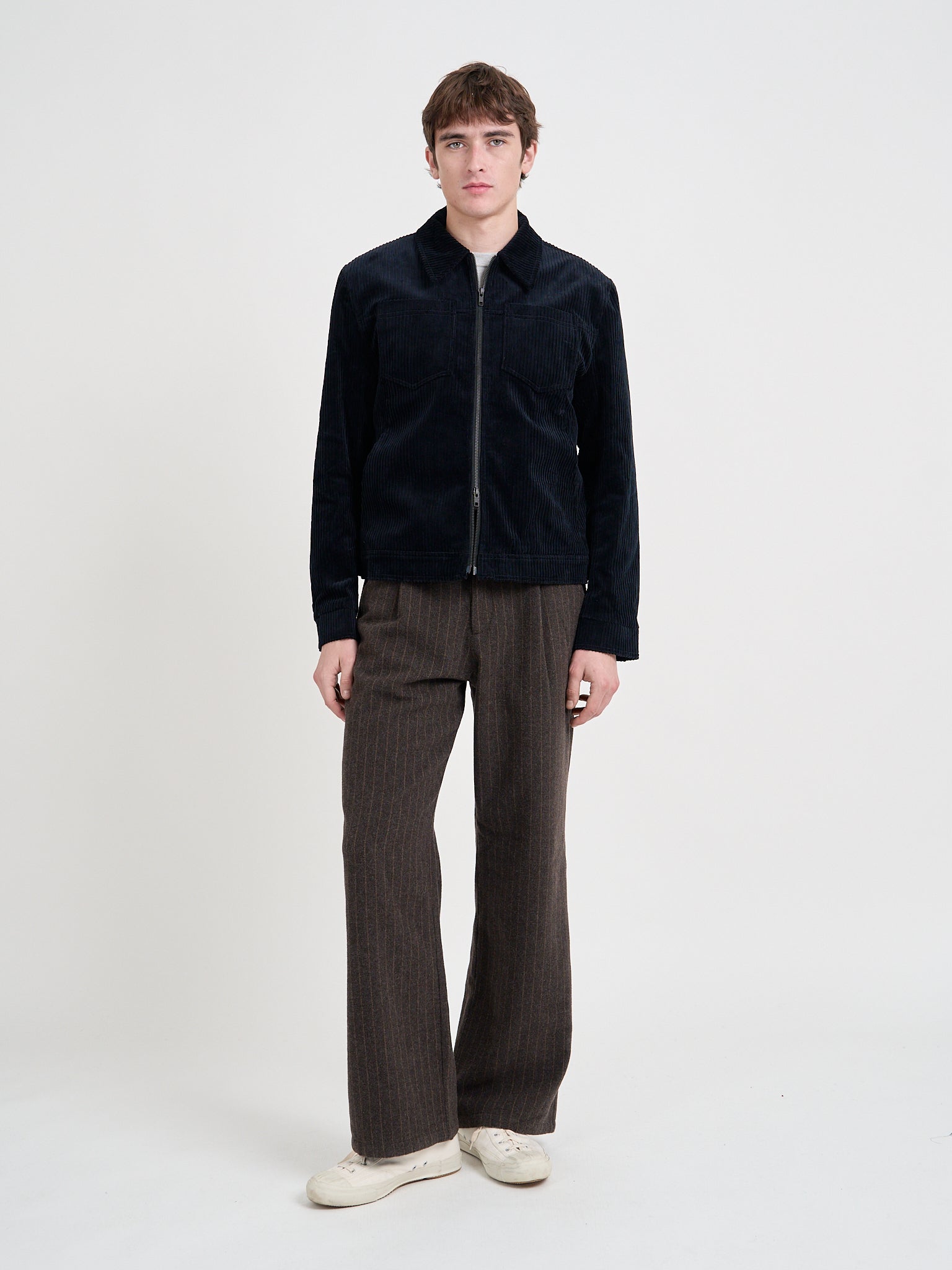 Model wearing Oliver Spencer Men's Midnight Navy Cotton Corduroy Trucker Jacket Flat Shot
