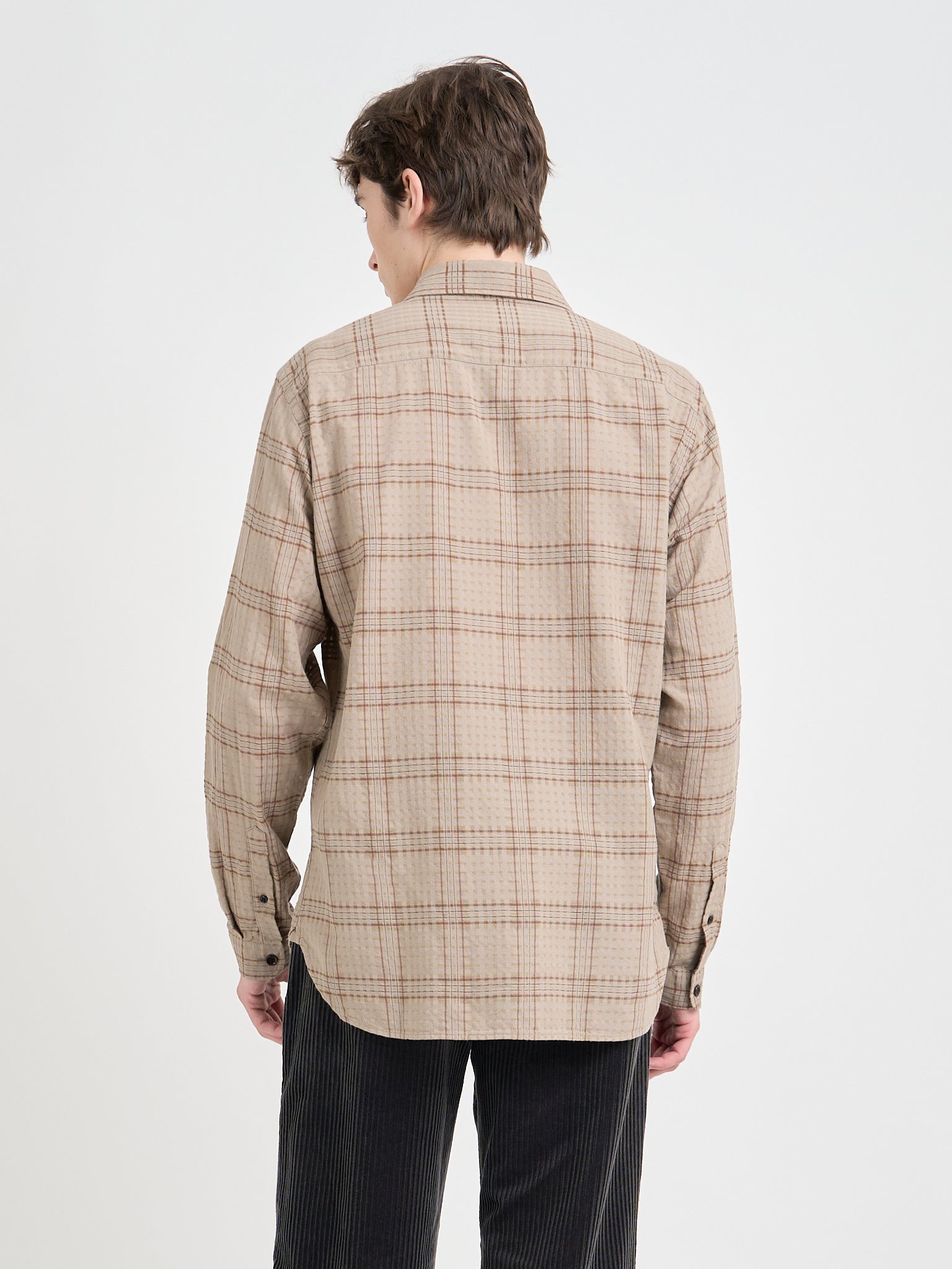 Model is wearing an Oliver Spencer New York Special Shirt in Connell Beige