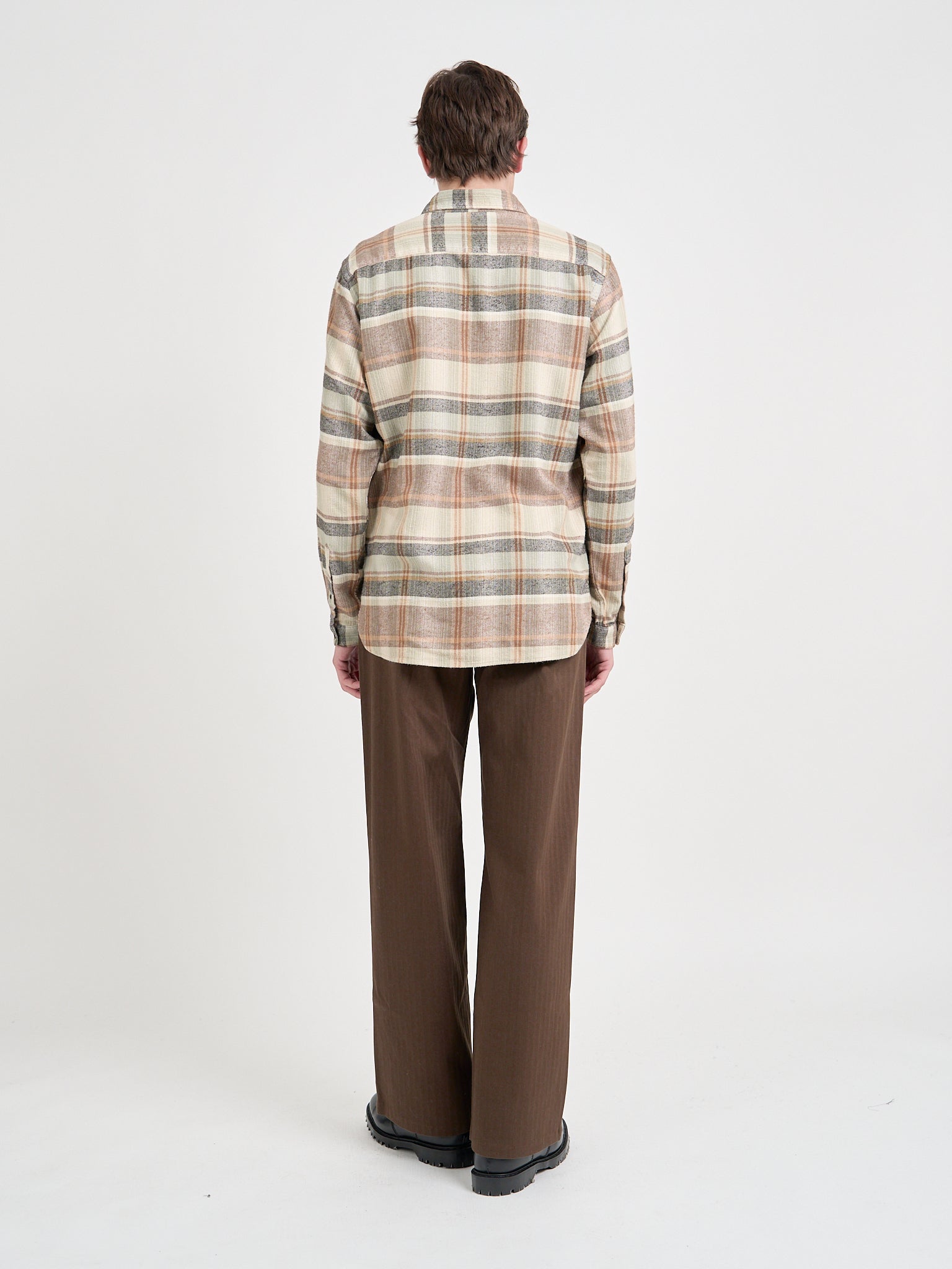 Model is wearing an Oliver Spencer New York Special Shirt in Robbins Multi