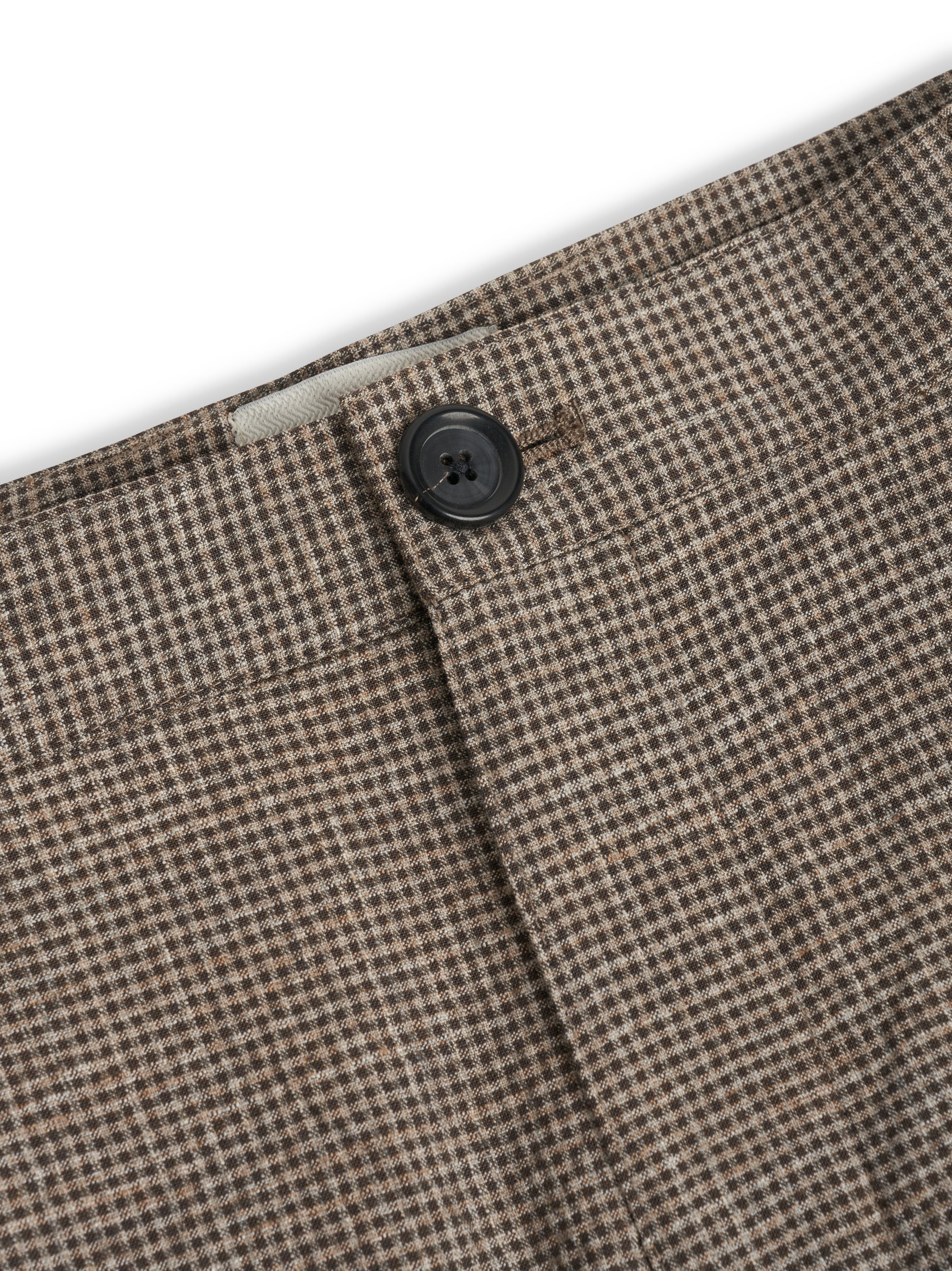 Single pleat and waistband detail on Hilliard brown Orsman trousers