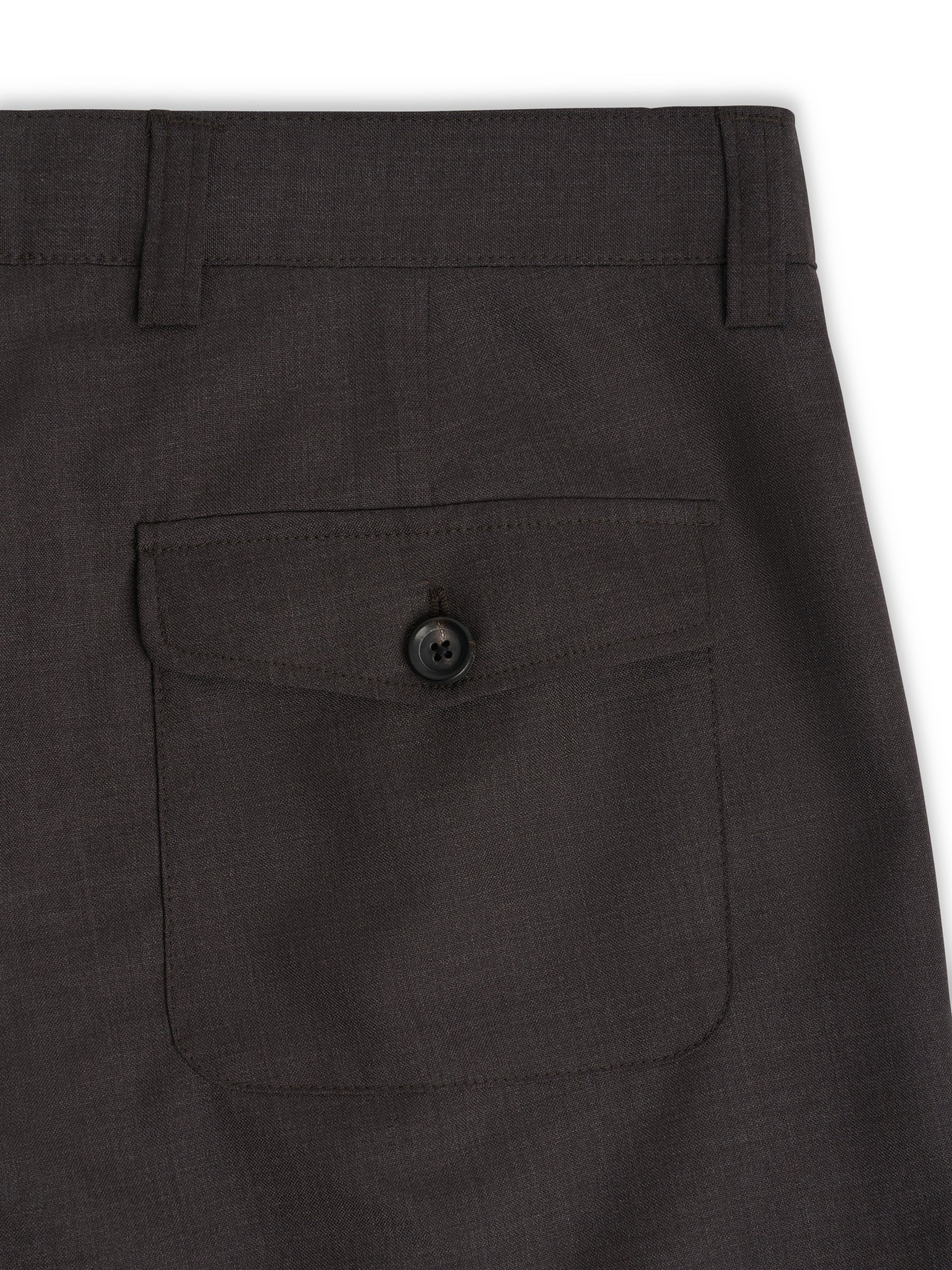 Rear patch pocket detail on Orsman Miro brown wide-leg trousers