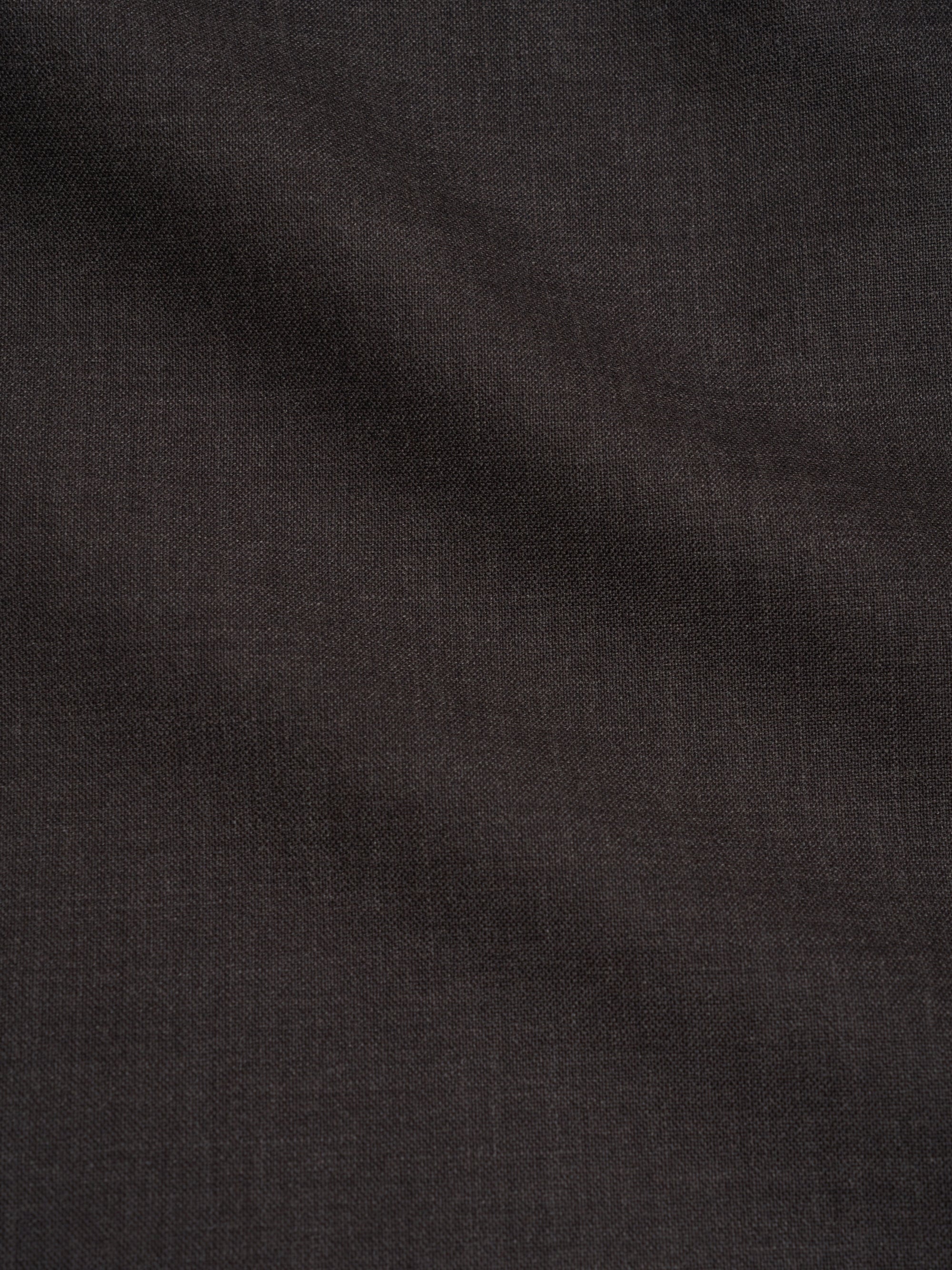 Close-up of brown tropical wool fabric used on Orsman trousers
