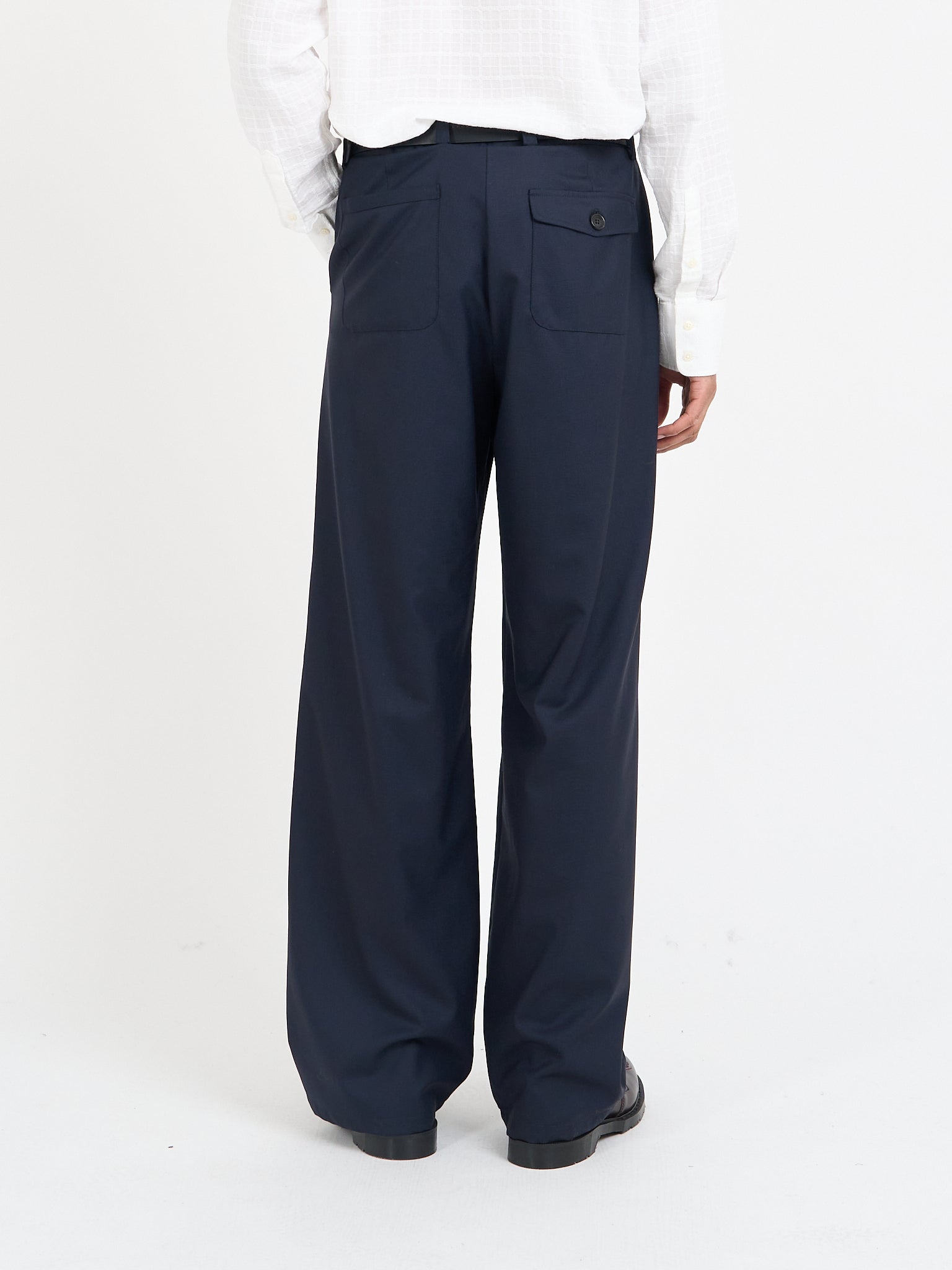 Rear view of Orsman trousers in navy tropical wool