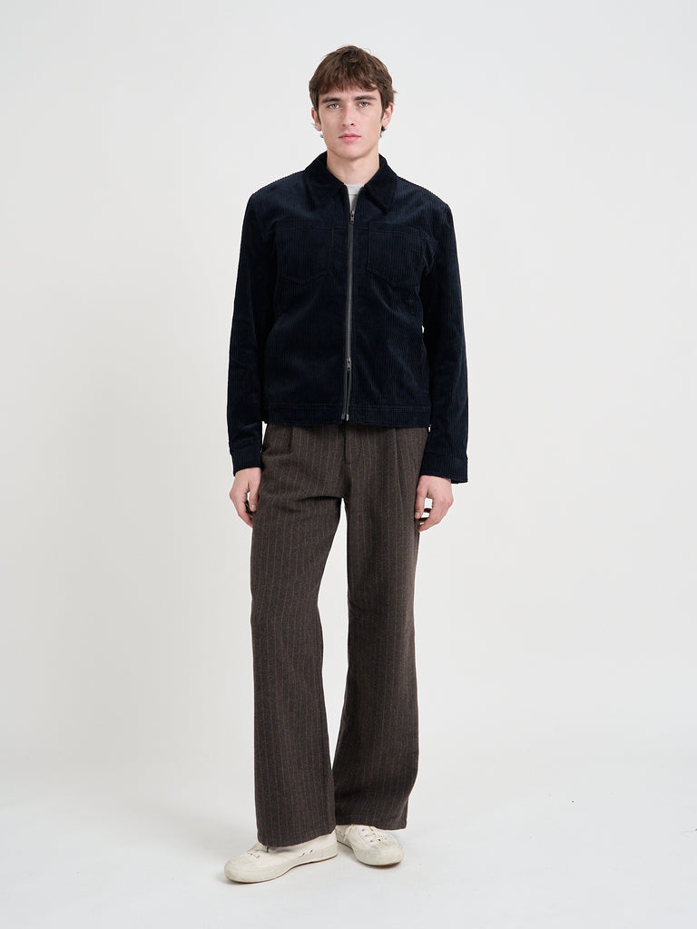 Video of model wearing Oliver Spencer Men's Midnight Navy Cotton Corduroy Trucker Jacket Flat Shot